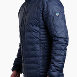 Man wearing a blue puffer jacket with a brand logo on a white background