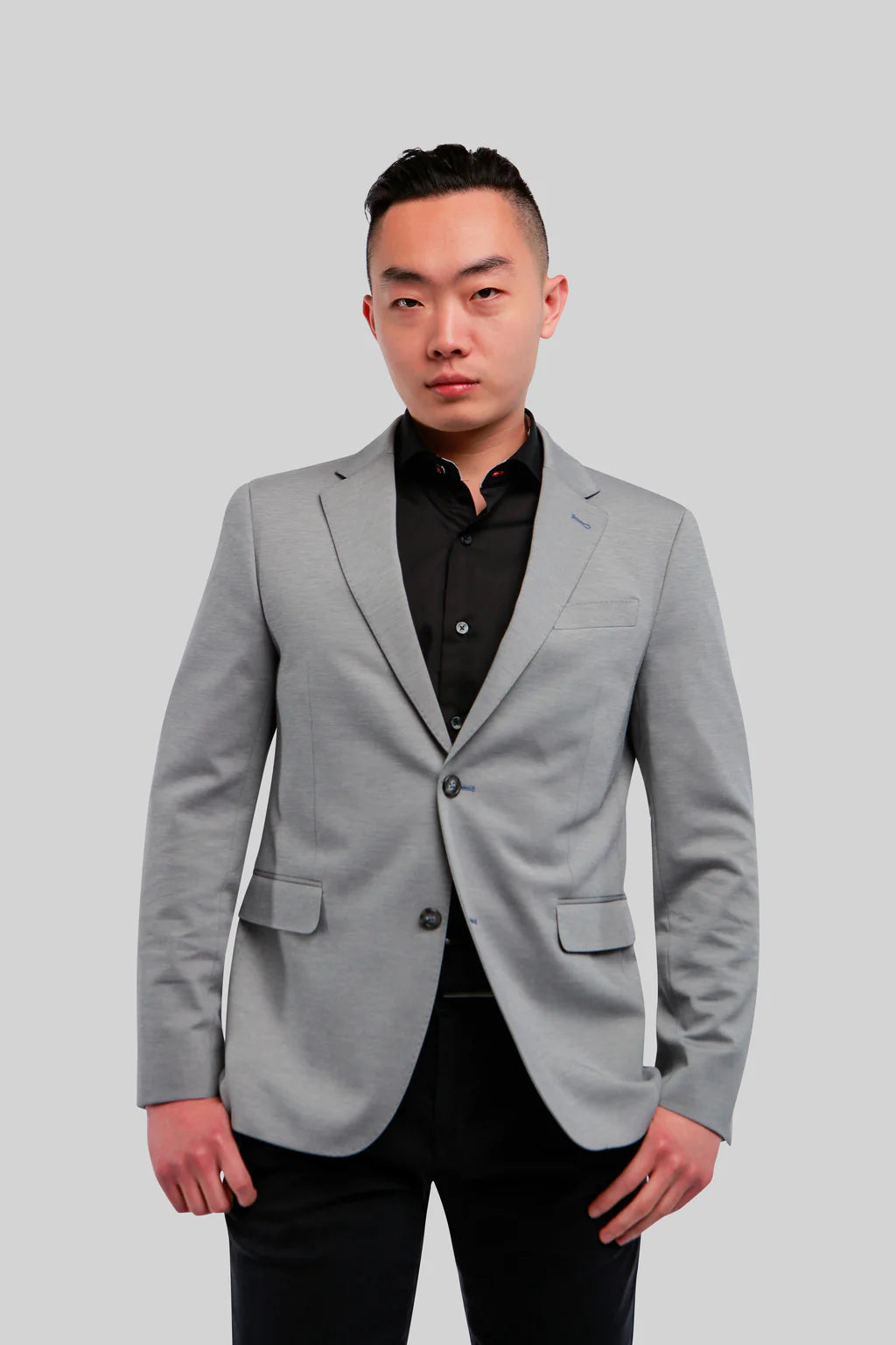 Sporty enough to wear with a t-shirt or knit, and dressy enough to wear with a woven shirt; this blazer breaks the mold of a traditional black jacket.