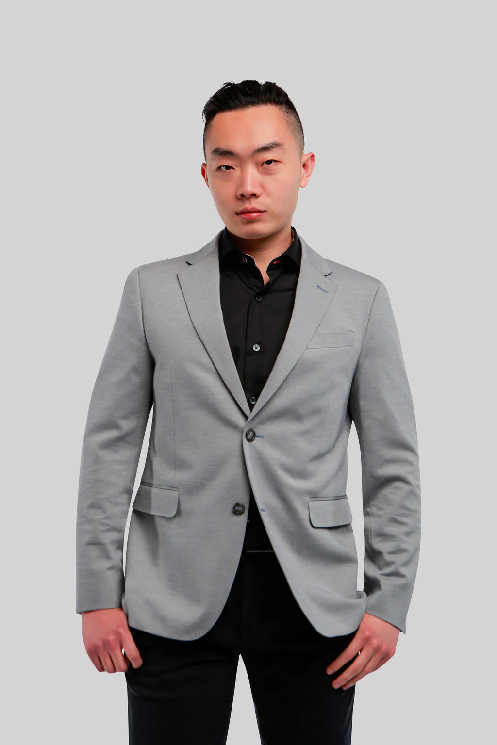 Sporty enough to wear with a t-shirt or knit, and dressy enough to wear with a woven shirt; this blazer breaks the mold of a traditional black jacket. 