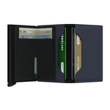 Its slim profile makes the Slimwallet fit perfectly into every pocket. The open exterior is cut extra wide to hold cards, banknotes and receipts. The Cardprotector mechanism allows you to slide out cards with one simple motion, while the aluminium protects your cards from bending, breaking and unwanted wireless communication.