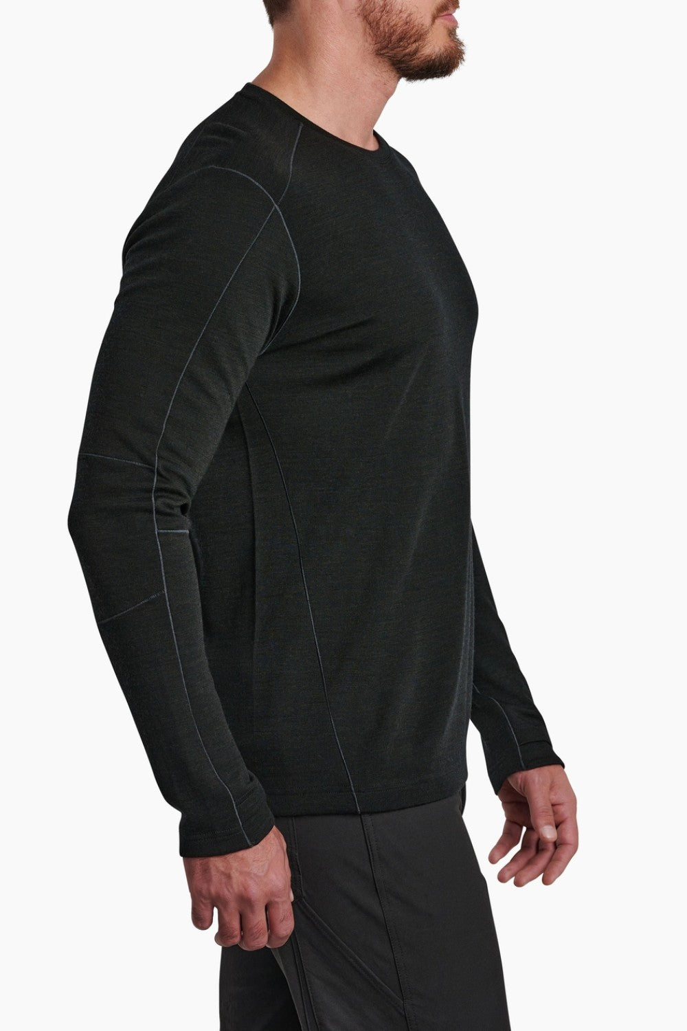 Man wearing a black long-sleeve shirt on a white background