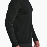 Man wearing a black long-sleeve shirt on a white background