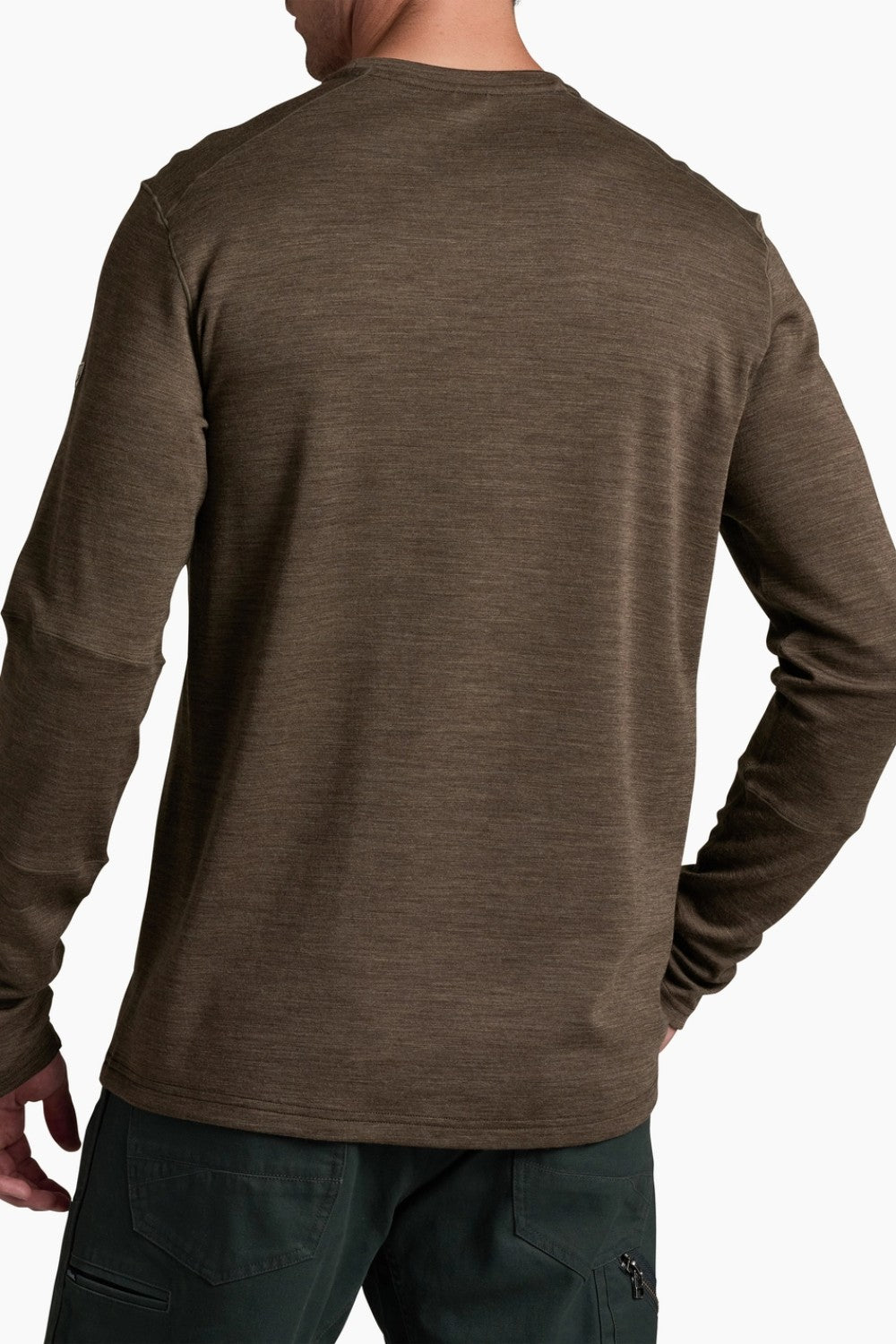 Brown long-sleeve shirt worn by a person on a white background