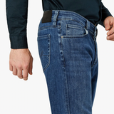 A contemporary fabrication complements the classic styling of this higher-rise, straight leg jean. They are cut from premium stretch denim that has a distinguished, modern appearance in a versatile wash to easily transition from casual to semiformal. Designed with comfort and effortless wear in mind, these have a relaxed fit through the leg that’s tailored to eliminate excess fabric at the hip and thigh.