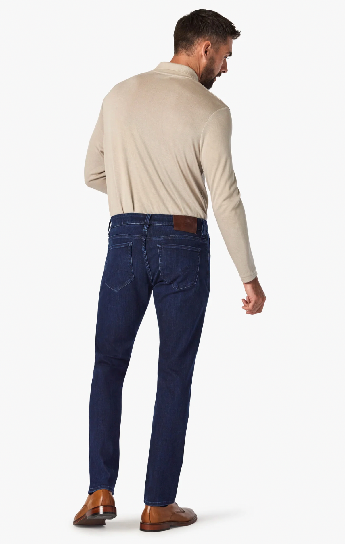 Elevate any occasion in this pair of sleek, dark-wash jeans cut from denim with a luxe look and feel. Made for movement with a higher proportion of elastane, this pair still maintains the texture of an authentic jean. A modern straight leg feels just roomy enough while flattering from every angle.