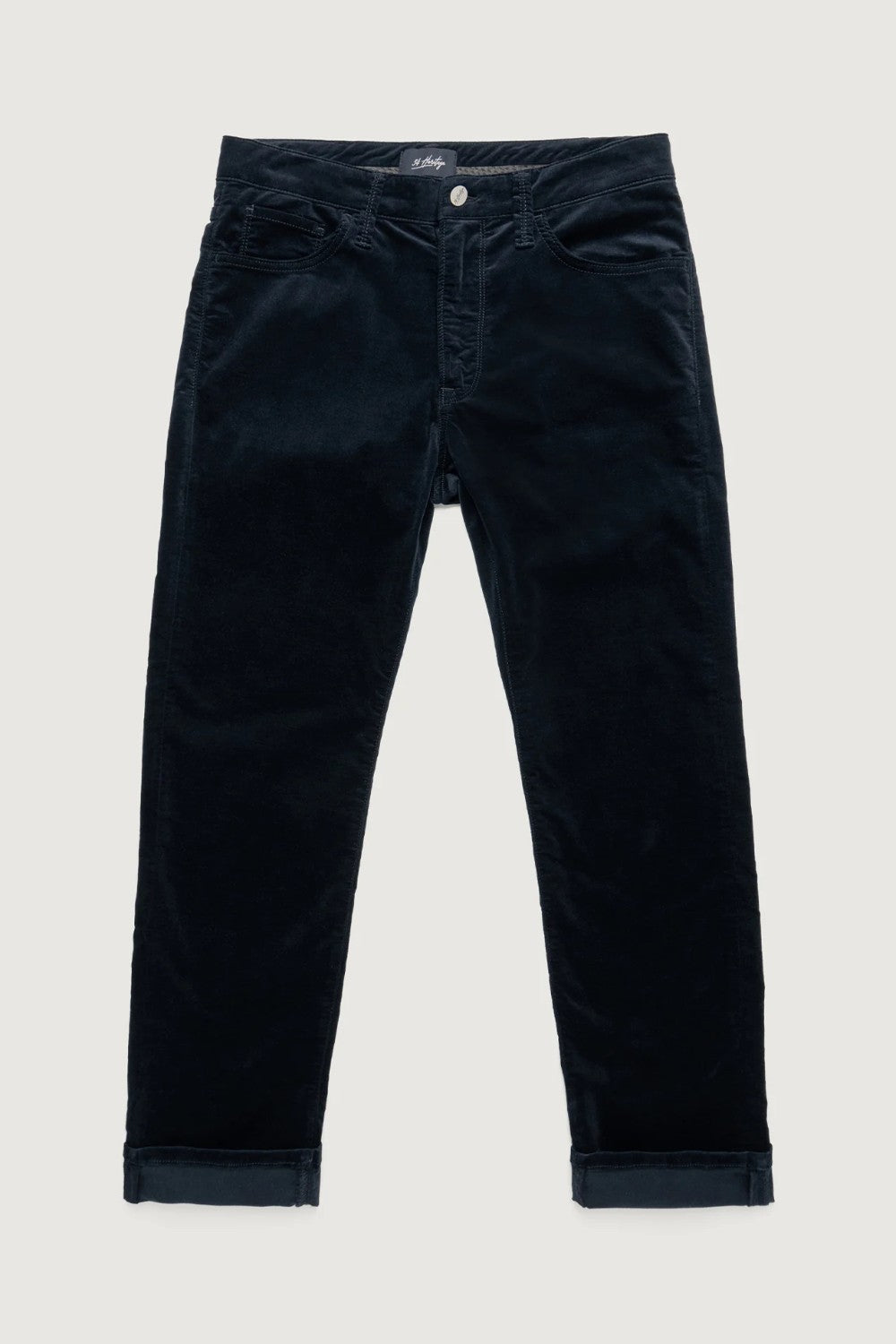 Dark blue jeans on a light gray background