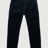 Dark blue jeans on a light gray background