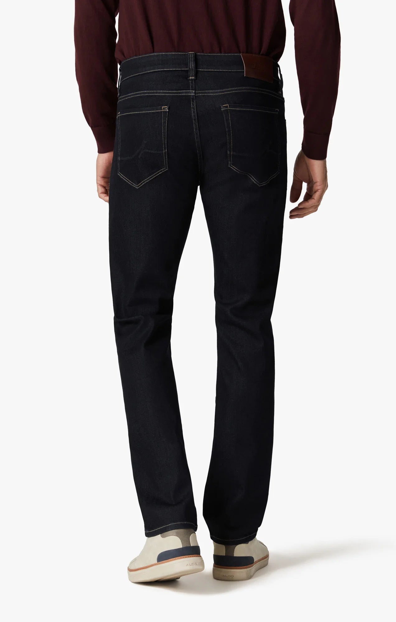 These contemporary pants are designed in a tailored, straight leg silhouette. Detailed with tonal hardware and contrast stitching, this mid-weight staple elevates any ensemble with its superior comfort, soft hand feel, and exceptional stretch.
