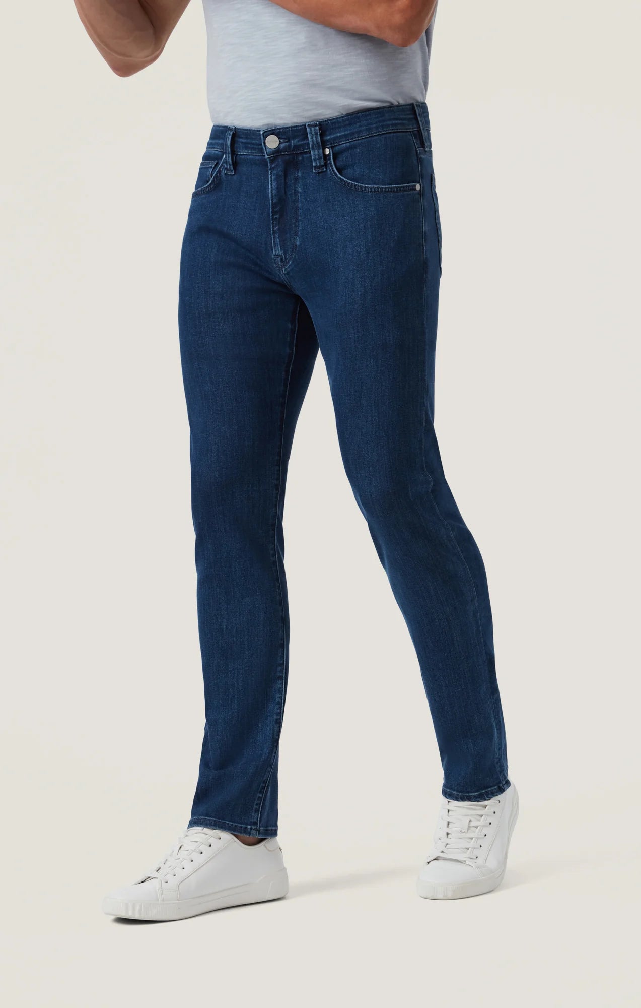 Crafted with a modern mid-rise and an ultra-comfortable straight-leg fit, these jeans offer the perfect balance of contemporary style and timeless appeal. Made from premium, sustainable recycled materials, they’re finished in a sleek night blue wash for an effortlessly refined look ideal for everyday wear.