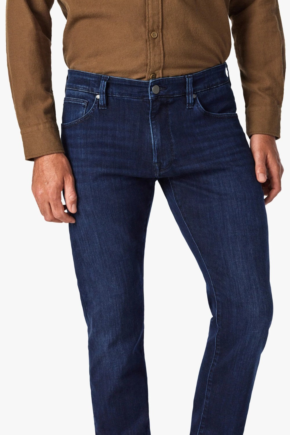 Dress up the everyday with this dark-wash jean designed with a streamlined slim leg and denim that has a luxe look and feel. The fabrication has a higher proportion of elastane for maximum stretch, all while maintaining the appearance of an authentic, elegant jean.