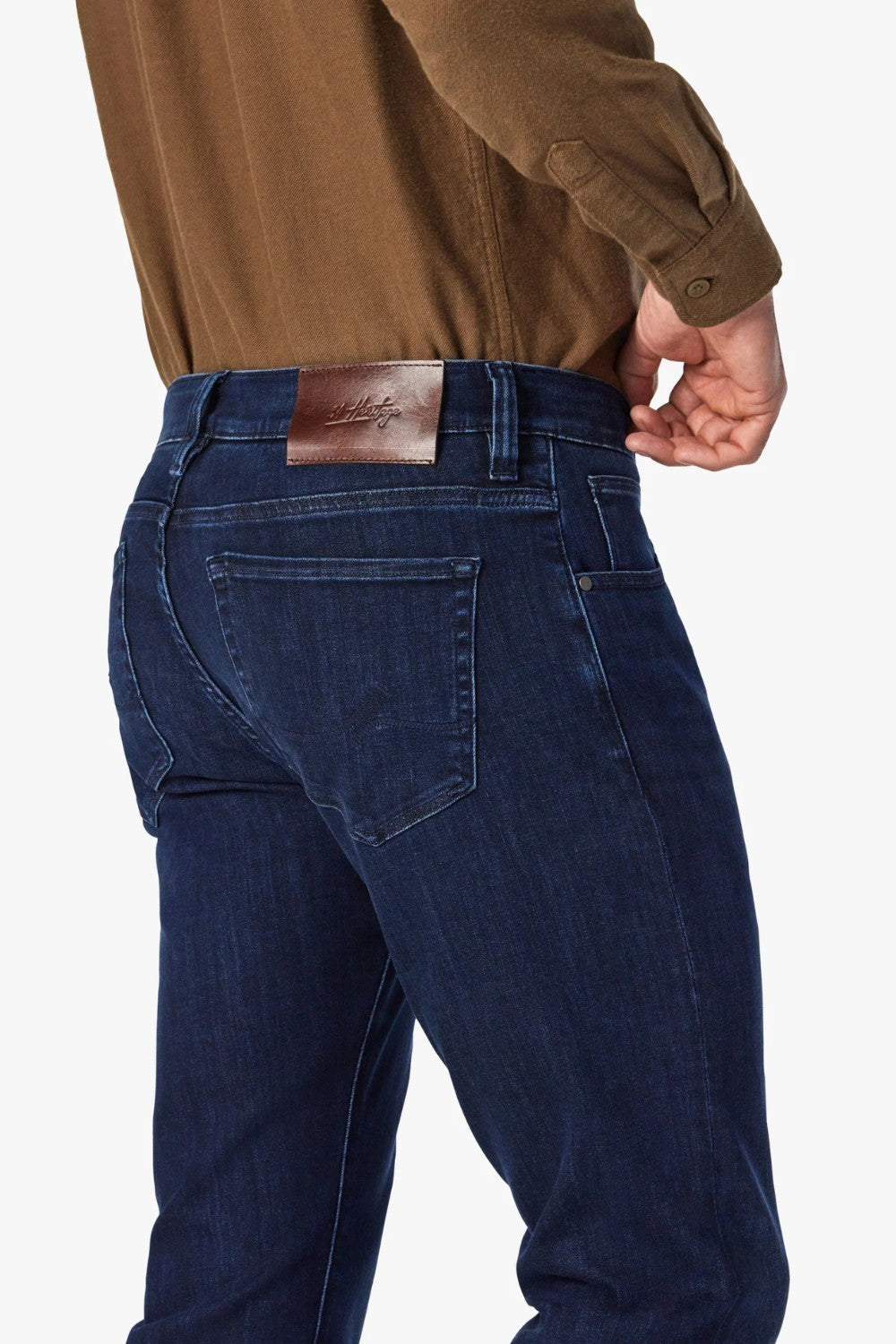 Dress up the everyday with this dark-wash jean designed with a streamlined slim leg and denim that has a luxe look and feel. The fabrication has a higher proportion of elastane for maximum stretch, all while maintaining the appearance of an authentic, elegant jean.