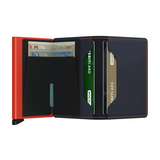 Its slim profile makes the Slimwallet fit perfectly into every pocket. The open exterior is cut extra wide to hold cards, banknotes and receipts. The Cardprotector mechanism allows you to slide out cards with one simple motion, while the aluminium protects your cards from bending, breaking and unwanted wireless communication.