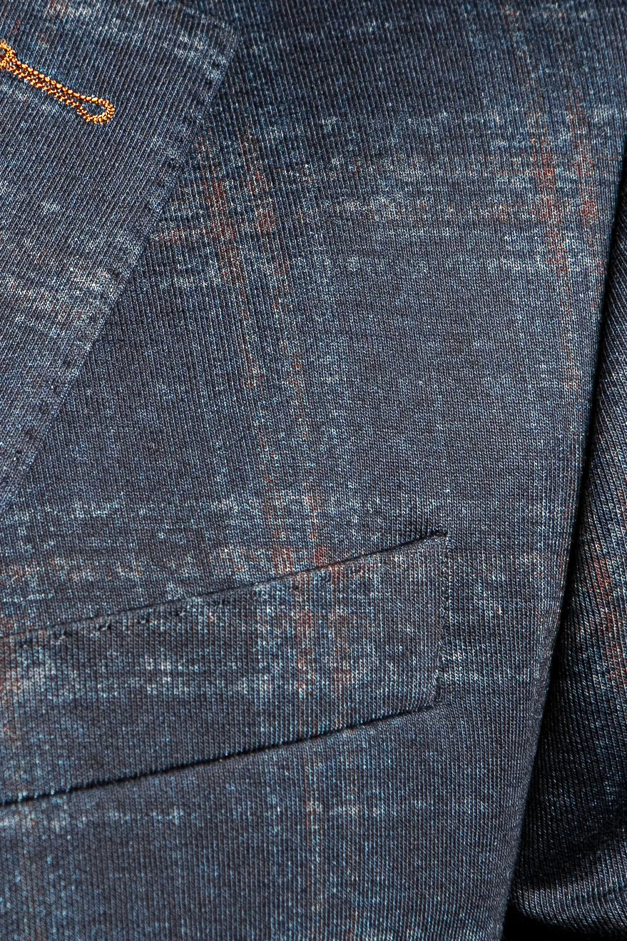 Constructed using a beautiful combination of navy and orange, this navy plaid blazer will be a go to jacket in your wardrobe year round. 