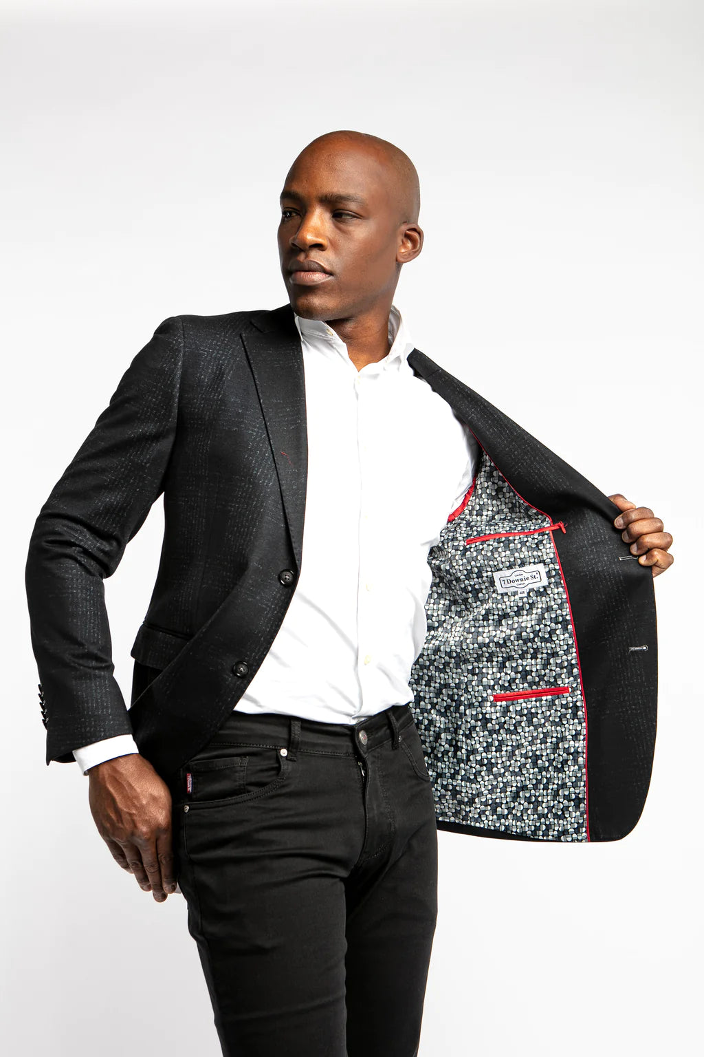 Sporty enough to wear with a t-shirt or knit, and dressy enough to wear with a woven shirt; this blazer breaks the mold of a traditional black jacket.
