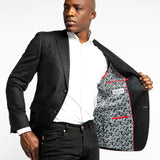 Sporty enough to wear with a t-shirt or knit, and dressy enough to wear with a woven shirt; this blazer breaks the mold of a traditional black jacket.