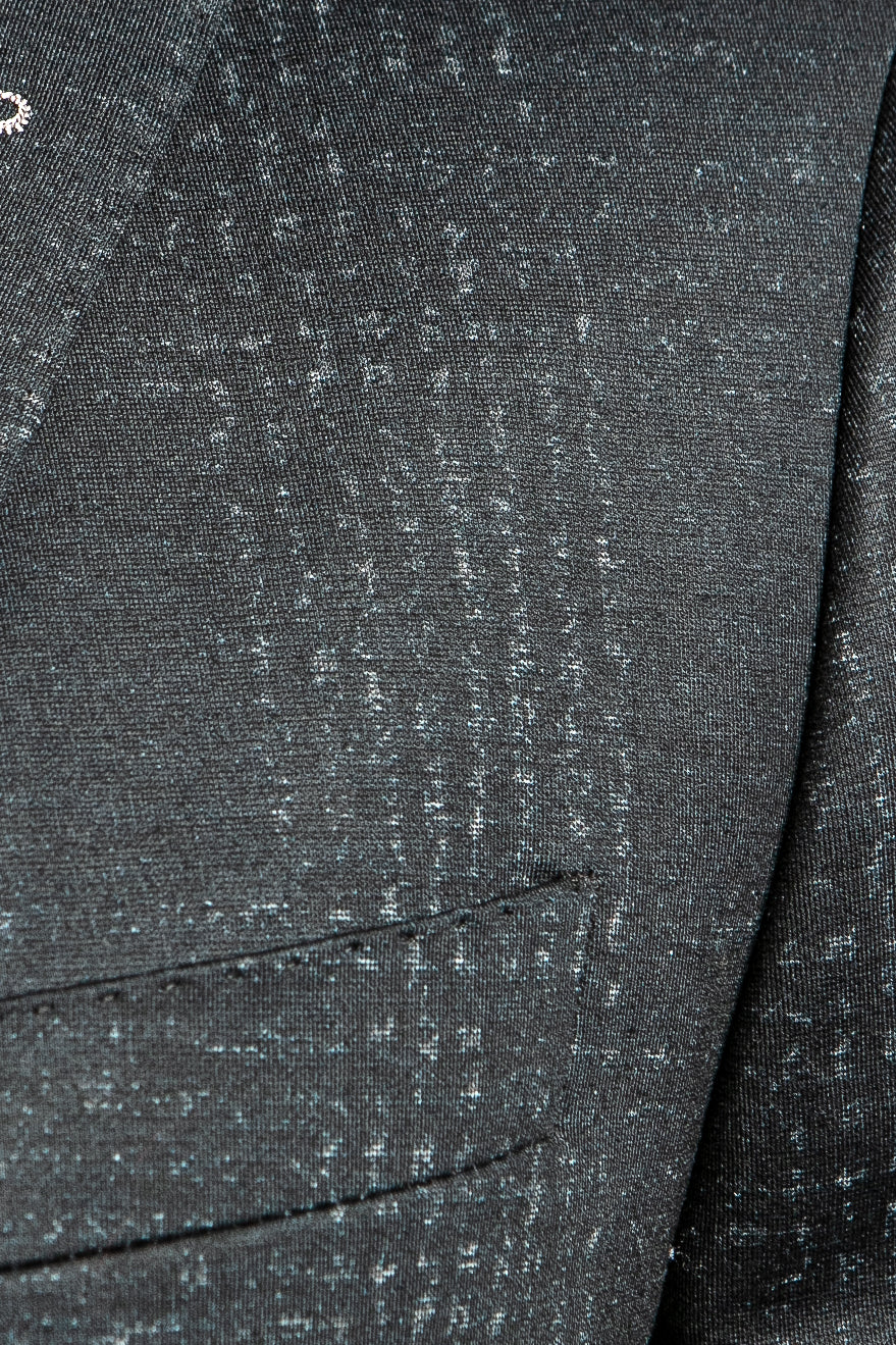 Sporty enough to wear with a t-shirt or knit, and dressy enough to wear with a woven shirt; this blazer breaks the mold of a traditional black jacket.