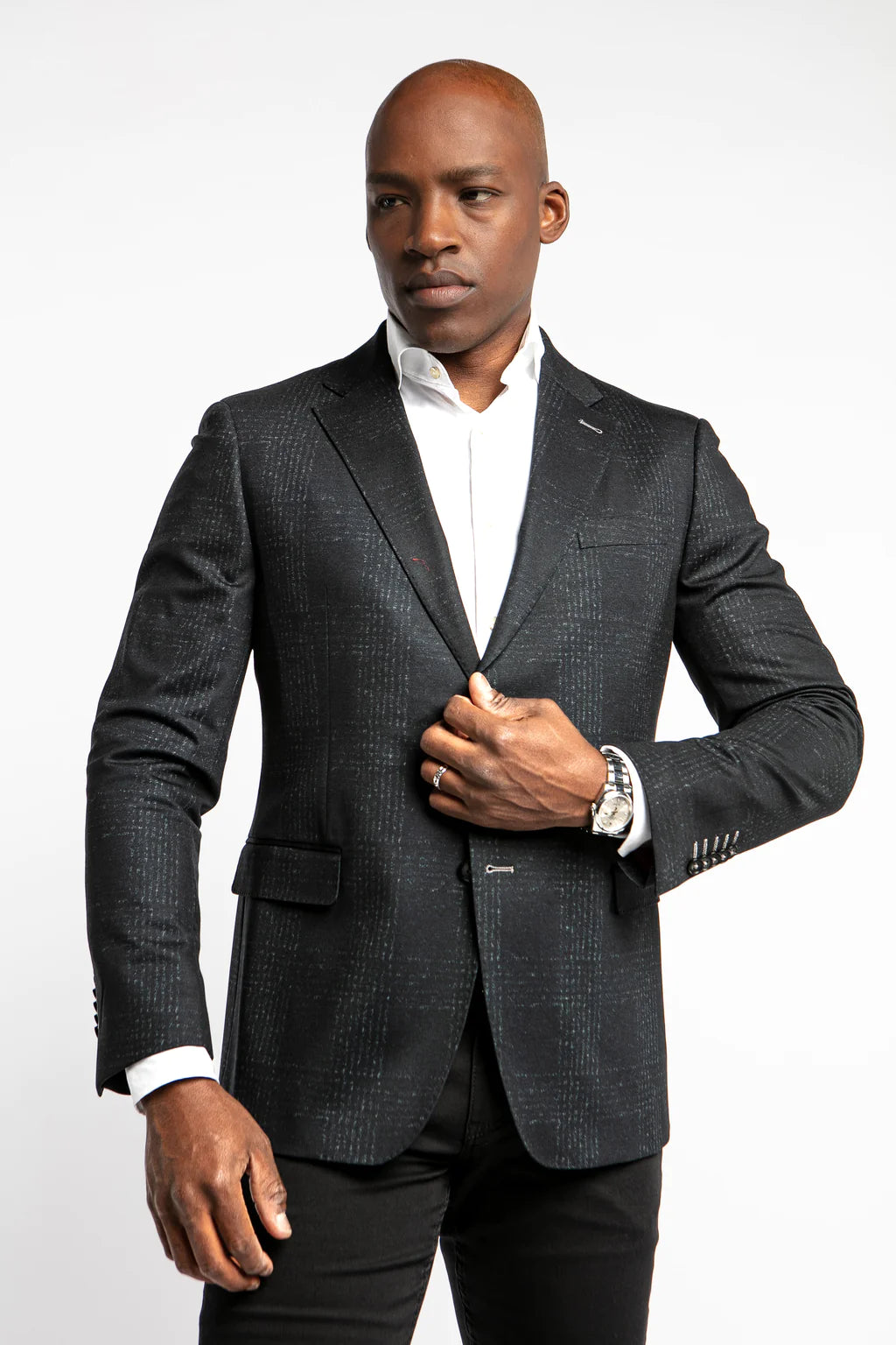 Sporty enough to wear with a t-shirt or knit, and dressy enough to wear with a woven shirt; this blazer breaks the mold of a traditional black jacket.
