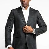 Sporty enough to wear with a t-shirt or knit, and dressy enough to wear with a woven shirt; this blazer breaks the mold of a traditional black jacket.