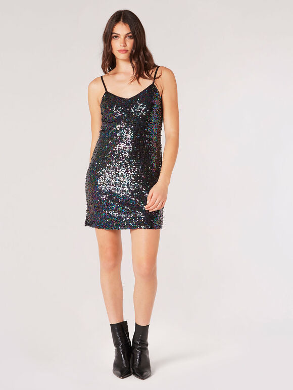 <br> <p>Be the life of the party in this stunning Apricot Rainbow Sequin Cami Dress! Featuring all-over rainbow sequins, this dress will make a statement with on-trend style. Make your next event a memorable one in this show-stopping dress. Sparkle on!</p>