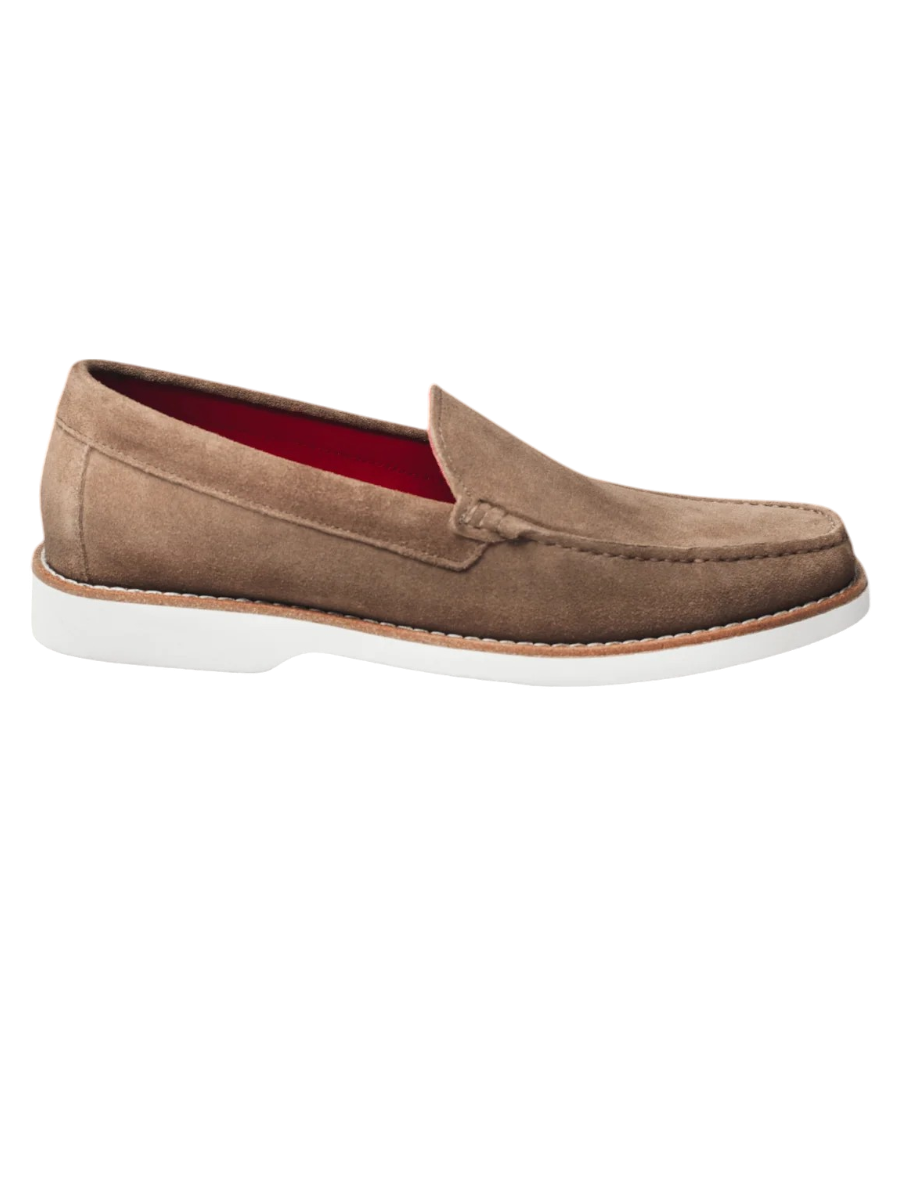 This elegant and refined tan loafer features a bold red sole, adding a modern touch to a classic design. Crafted from high-quality materials, it offers optimum comfort while being perfect for both formal and casual occasions. Its timeless style makes it a must-have for any sophisticated wardrobe.