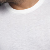 The MARINI sweater offers an elegant round neck and is crafted from an extra-fine merino wool blend. It features a rib-knit round neck, cuffs and Size for a comfortable fit. The sweater is made from a high-twist yarn, which not only enhances its durability, but also allows for breathability and makes it hygroscopic, capable of effectively managing moisture. 
