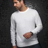 The MARINI sweater offers an elegant round neck and is crafted from an extra-fine merino wool blend. It features a rib-knit round neck, cuffs and Size for a comfortable fit. The sweater is made from a high-twist yarn, which not only enhances its durability, but also allows for breathability and makes it hygroscopic, capable of effectively managing moisture. 