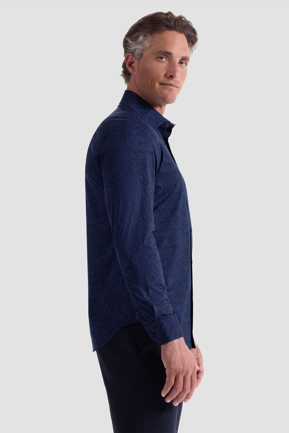The James OoohCotton long-sleeved shirt in marbled print features a point collar and a curved hem for a sleek tucked or untucked look. The notched cuffs are adjustable to allow for customized fit and also convertible to accommodate cufflinks. OoohCotton® is a performance, double-mercerized, wrinkle-resistant, breathable, and easy-care cotton blend with 8-way stretch, quick-dry, and thermal comfort properties.
