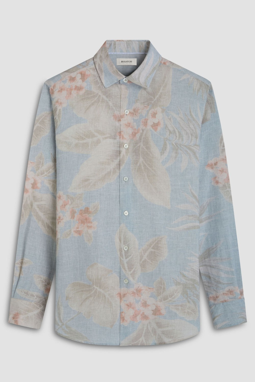 The Julian long-sleeve shirt in a floral print is crafted from a linen and cotton fabric. It features a point collar, a curved hem that can be worn tucked or untucked, mother-of-pearl buttons, and notched cuffs adjustable for a custom fit-wear them snug or loose. The combination of both fibers balances the crispness of linen with the softness and resilience of cotton to create a comfortable shirt perfect for any occasion.