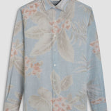 The Julian long-sleeve shirt in a floral print is crafted from a linen and cotton fabric. It features a point collar, a curved hem that can be worn tucked or untucked, mother-of-pearl buttons, and notched cuffs adjustable for a custom fit-wear them snug or loose. The combination of both fibers balances the crispness of linen with the softness and resilience of cotton to create a comfortable shirt perfect for any occasion.