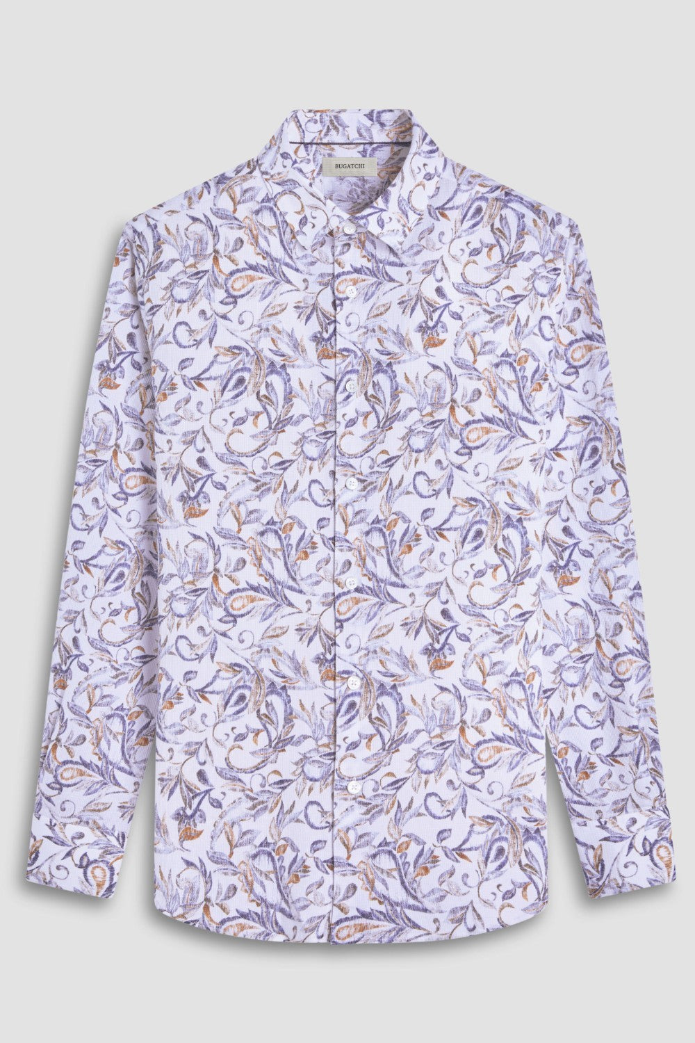 The Julian long-sleeve shirt is crafted from a linen and cotton fabric. It features a point collar, a curved hem that can be worn tucked or untucked, mother-of-pearl buttons, and notched cuffs adjustable for a custom fit-wear them snug or loose. The combination of both fibers balances the crispness of linen with the softness and resilience of cotton to create a comfortable shirt perfect for any occasion.