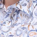 The Julian long-sleeve shirt is crafted from a linen and cotton fabric. It features a point collar, a curved hem that can be worn tucked or untucked, mother-of-pearl buttons, and notched cuffs adjustable for a custom fit-wear them snug or loose. The combination of both fibers balances the crispness of linen with the softness and resilience of cotton to create a comfortable shirt perfect for any occasion.