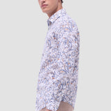 The Julian long-sleeve shirt is crafted from a linen and cotton fabric. It features a point collar, a curved hem that can be worn tucked or untucked, mother-of-pearl buttons, and notched cuffs adjustable for a custom fit-wear them snug or loose. The combination of both fibers balances the crispness of linen with the softness and resilience of cotton to create a comfortable shirt perfect for any occasion.