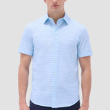 The Miles OoohCotton short-sleeve shirt in basketweave print features a point collar, mother-of-pearl buttons, and a curved hem for a sleek tucked or untucked look. OoohCotton is a performance, double-mercerized, wrinkle-resistant, breathable, and easy-care cotton blend with 8-way stretch, quick-dry, and thermal comfort properties.