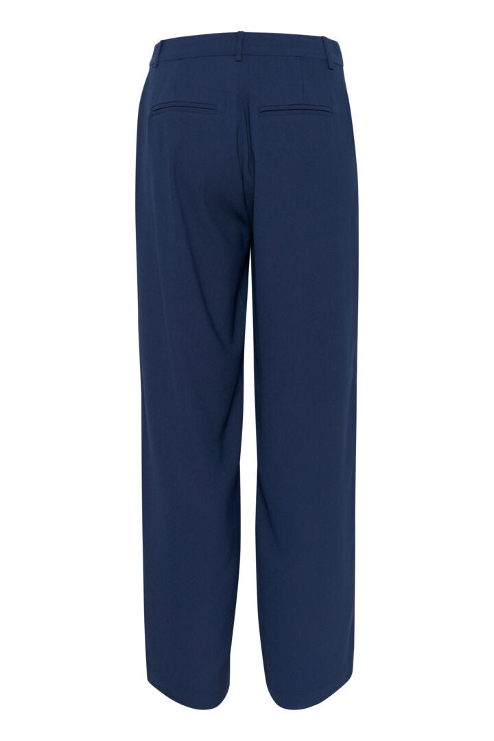 The Cream Cocamia Pant is a versatile and stylish addition to any wardrobe. With its blue colour, this pant offers a sleek and sophisticated look. The zip and button closure, along with the elastic back waist, provide a comfortable fit for all-day wear. Complete with pockets and belt loops, this pant offers both style and functionality.