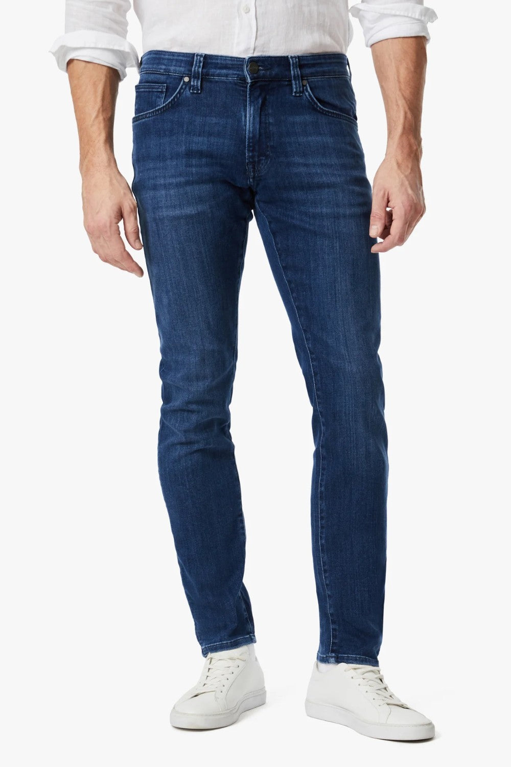 This pair of denim is perfect for the man seeking a distinguished look without compromising on comfort. These are cut from smooth, premium denim that features superior stretch and shape retention in a versatile wash that’s effortless to wear while enhancing the streamlined silhouette. A contemporary fit that’s endlessly flattering, these have a mid rise and tailored straight leg that features subtle tapering from the knee down.