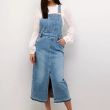 The denim dress is a classic choice, offering a flattering regular waist and ankle-length design. Featuring a sleeveless cut, it's crafted for a chic and effortless style. The material blend ensures durability and slight stretch for a fit that's tailored to you.
