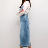The denim dress is a classic choice, offering a flattering regular waist and ankle-length design. Featuring a sleeveless cut, it's crafted for a chic and effortless style. The material blend ensures durability and slight stretch for a fit that's tailored to you.