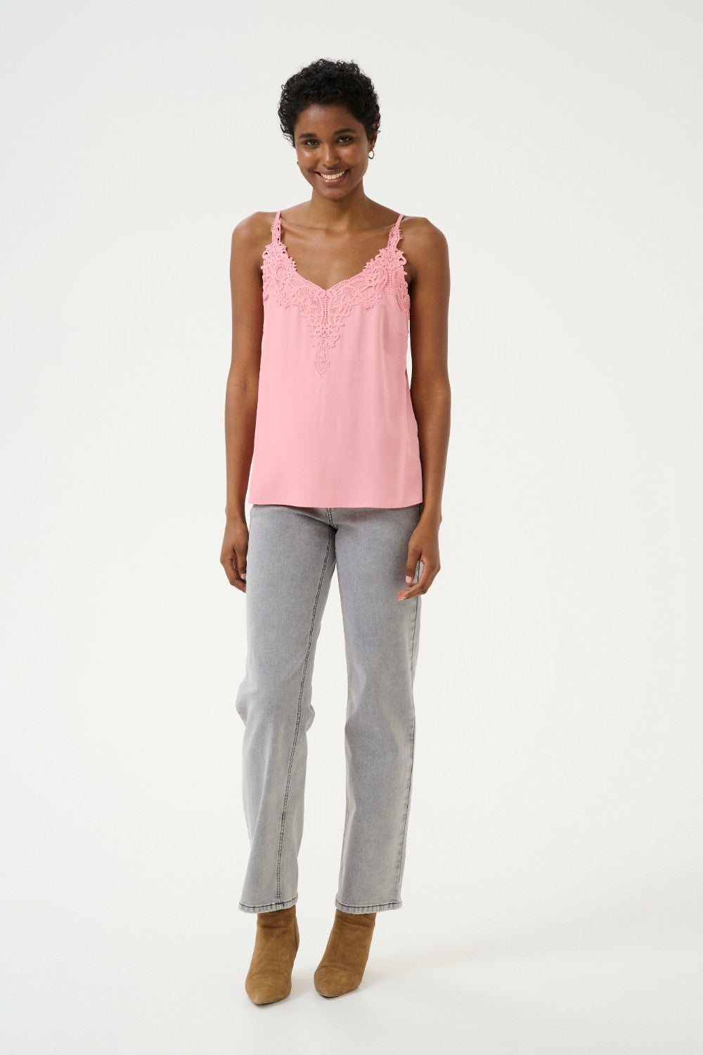 A basic wardrobe essential with an elevated look! The Cream Anna Top is a cami you’re sure to love – it features a classic colour and its comfortable, adjustable straps make it a top that's sure to win you over. Classy enough for a meeting, yet fun enough for drinks with friends? Yes please!