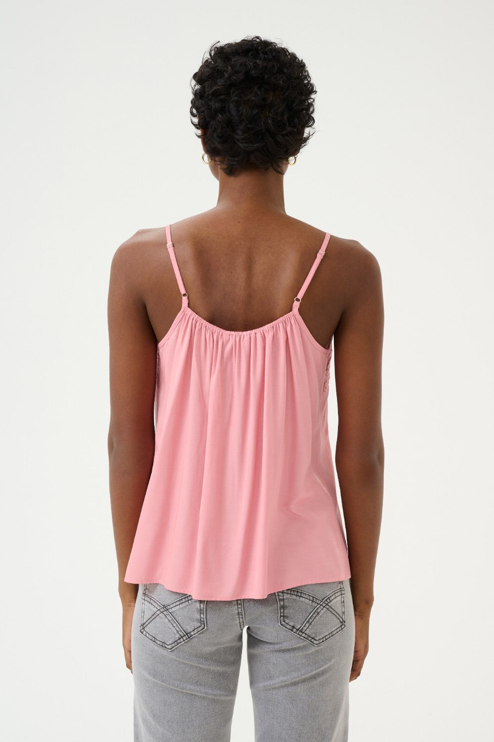 A basic wardrobe essential with an elevated look! The Cream Anna Top is a cami you’re sure to love – it features a classic colour and its comfortable, adjustable straps make it a top that's sure to win you over. Classy enough for a meeting, yet fun enough for drinks with friends? Yes please!