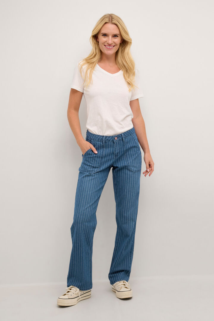 Introducing our Coco Fit Cream Frida Jeans, featuring a timeless white pinstripe design and a soft, comfortable fit. Expertly crafted to enhance your style and provide all-day comfort. Upgrade your wardrobe with these must-have jeans.