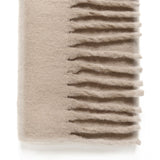 Beige blanket with fringe on a white background