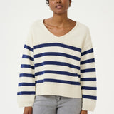 Sail away in style with the Cream Muka Knit Pullover. This nautical-inspired v-neck sweater is made of a comfortable cotton blend, perfect for any casual occasion. Smooth sailing guaranteed!