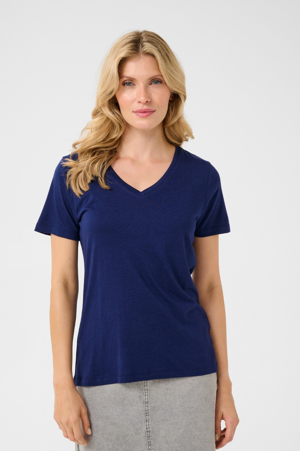 Expertly crafted for everyday wear, the Cream Naia T Shirt provides a timeless look with its classic design, short sleeves, and v neck. Made from high-quality materials, this solid shirt is a must-have basic in any wardrobe. Elevate your style with this versatile and comfortable shirt.