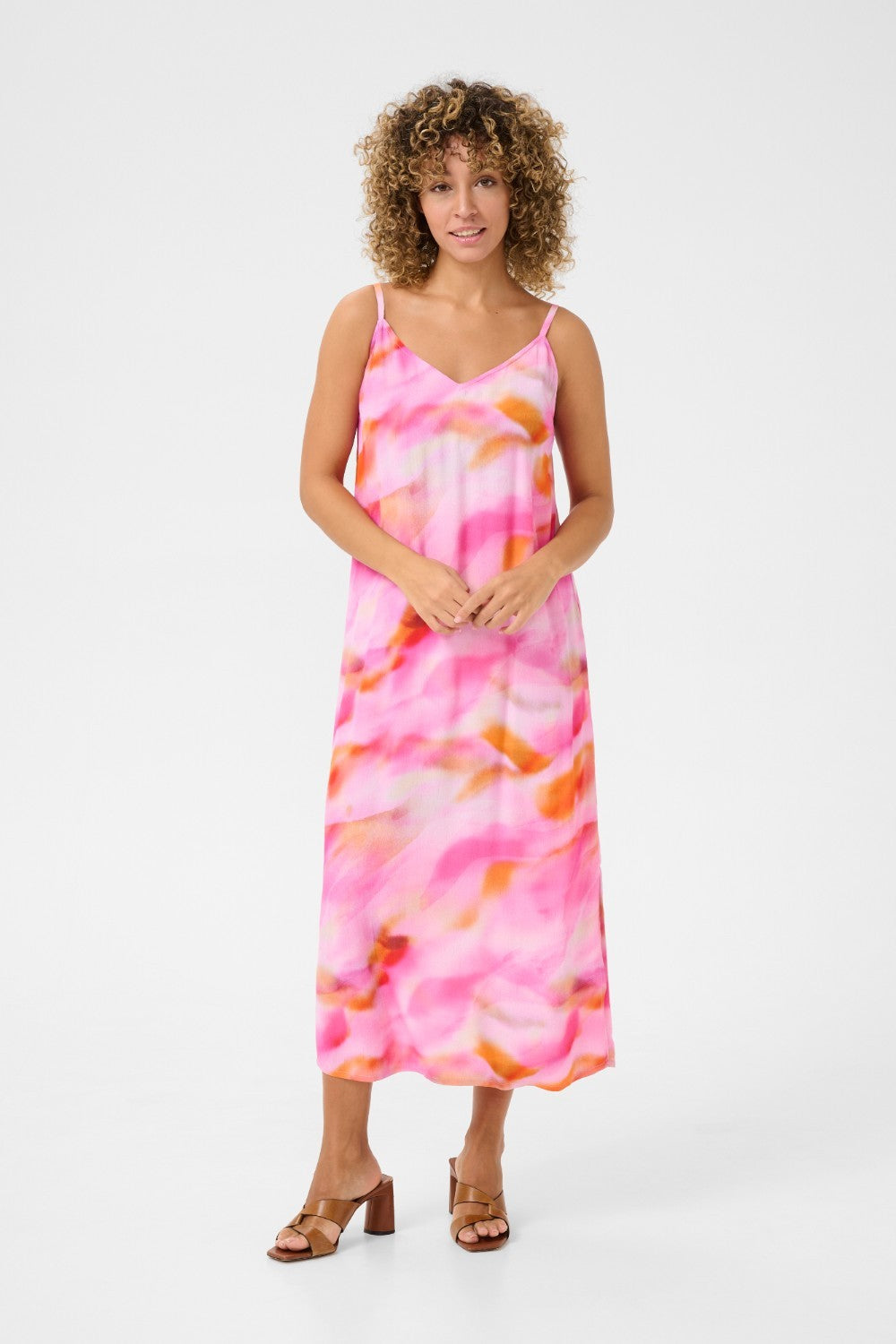 Experience cool comfort in our Cream Nana Slip Dress. This cheerful piece is perfect for any casual occasion, offering a relaxed and effortless style. Stay stylish while feeling at ease in this must-have dress.