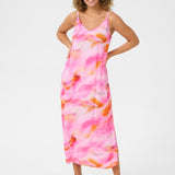 Experience cool comfort in our Cream Nana Slip Dress. This cheerful piece is perfect for any casual occasion, offering a relaxed and effortless style. Stay stylish while feeling at ease in this must-have dress.