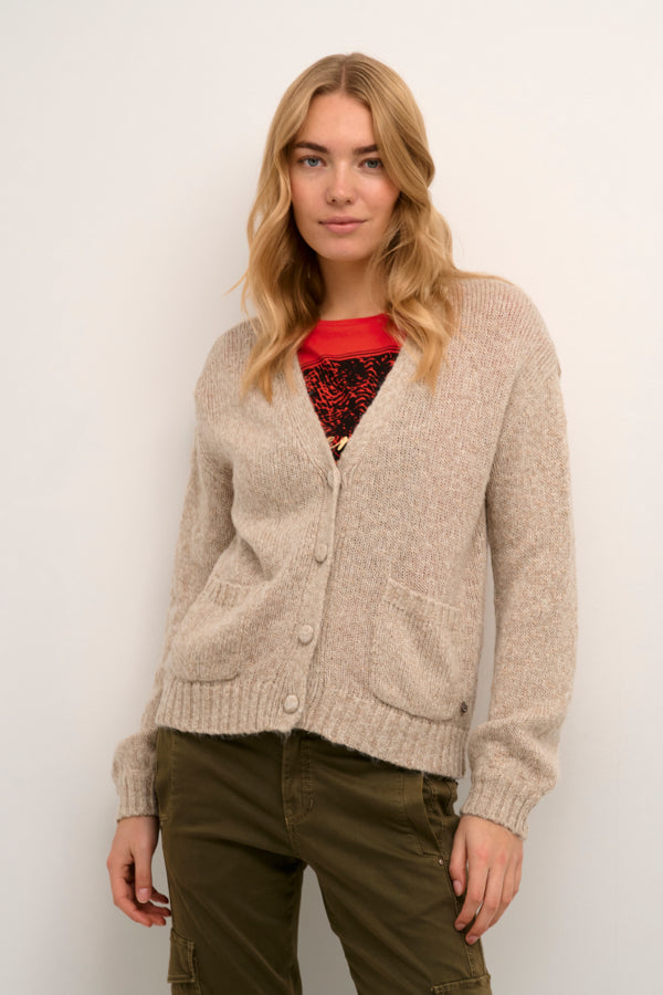 Stay cozy all season long in this Cream Persus Knit Cardigan! With its must-have melange knit fabric, this cardigan will upgrade any outfit with a touch of warmth and style.