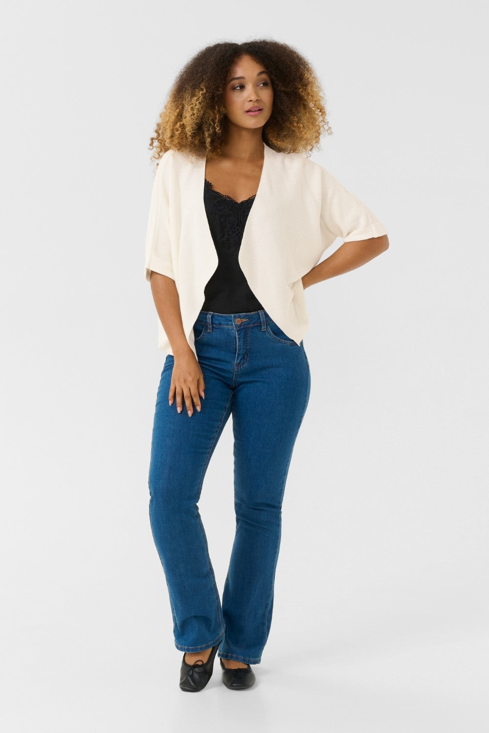 Our Cream Sillar Knit Bolero is back by popular demand! Made from 100% cotton, this cardigan makes layering easy and stylish. Perfect for any occasion, it's a must-have for your wardrobe.