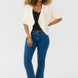Our Cream Sillar Knit Bolero is back by popular demand! Made from 100% cotton, this cardigan makes layering easy and stylish. Perfect for any occasion, it's a must-have for your wardrobe.