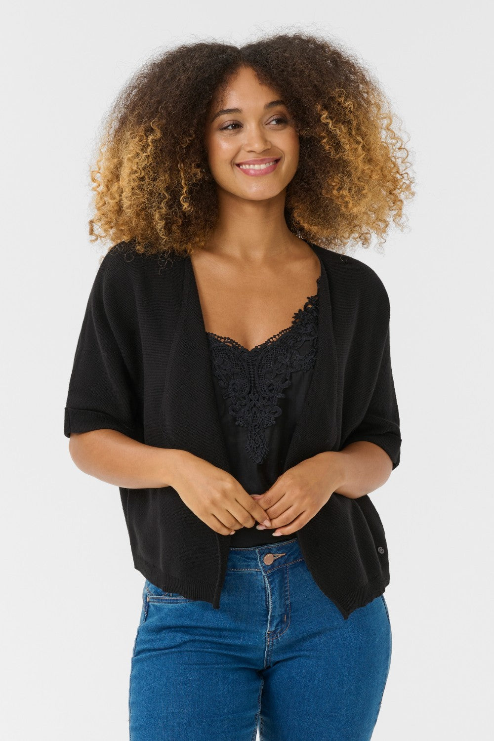 Our Cream Sillar Knit Bolero is back by popular demand! Made from 100% cotton, this cardigan makes layering easy and stylish. Perfect for any occasion, it's a must-have for your wardrobe.