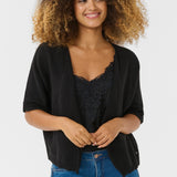 Our Cream Sillar Knit Bolero is back by popular demand! Made from 100% cotton, this cardigan makes layering easy and stylish. Perfect for any occasion, it's a must-have for your wardrobe.